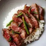 Chinesisches Rindfleisch mit Zwiebeln Pfannengericht 2 Chinesisches Rindfleisch mit Zwiebeln Pfannengericht