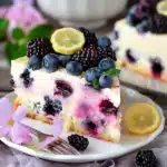 Zitronen-Blaubeer-Kuchen mit Cheesecake-Guss 2 Zitronen-Blaubeer-Kuchen mit Cheesecake-Guss